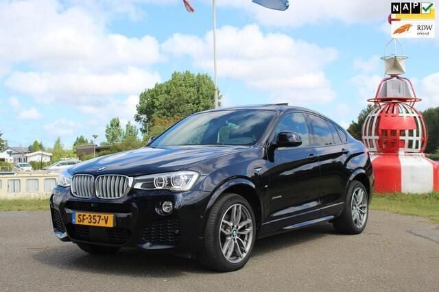 Zwart Gebruikt 2016 BMW X4 Executive SUV | € 33.495 (Eerlijke prijs) - Afbeelding 1/4