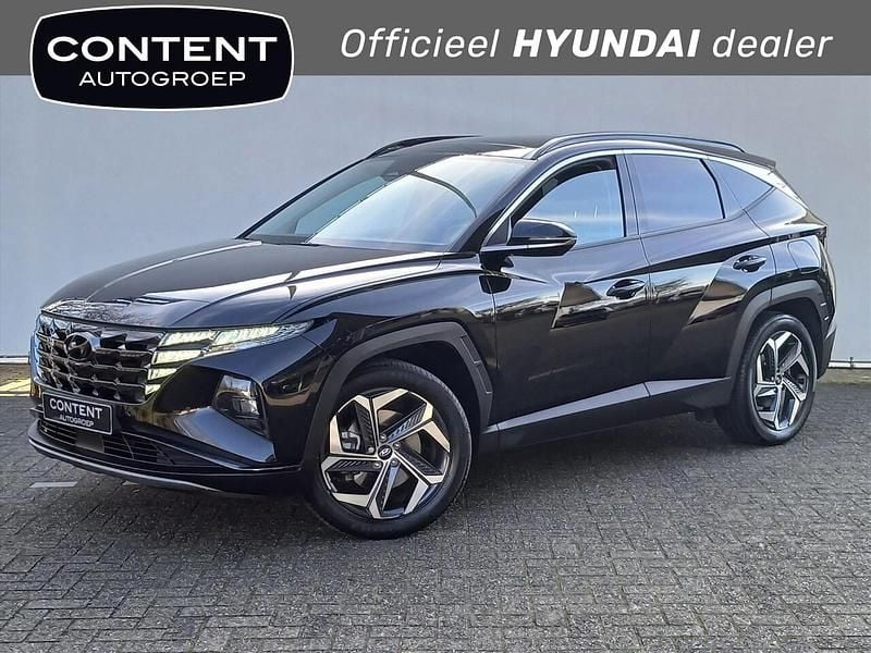 Abyss black (zwart mica) Occasion 2023 Hyundai Tucson Premium SUV | € 33.440 (Eerlijke prijs) - Afbeelding 1/4