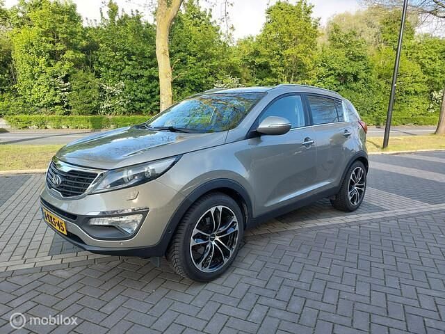 Grijs Gebruikt 2013 Kia Sportage SUV | € 7.650 (Eerlijke prijs) - Afbeelding 1/4