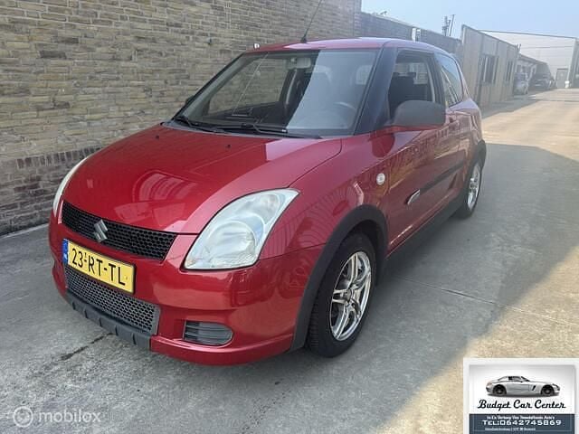 Rood Gebruikt 2005 Suzuki Swift Hatchback | € 1.295 (Goede deal) - Afbeelding 1/4