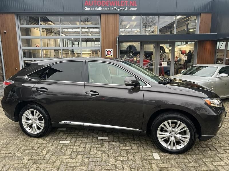 Bruin Gebruikt 2010 Lexus RX450h Executive Line SUV | € 14.950 (Eerlijke prijs) - Afbeelding 1/4