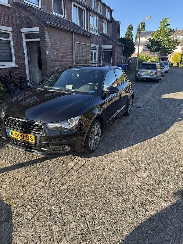 Zwart Gebruikt 2014 Audi A1 Ambition Hatchback | € 11.950 (Goede deal) - Afbeelding 1/4