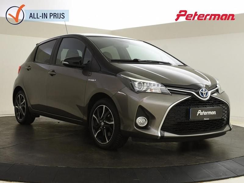 Bruin Gebruikt 2016 Toyota Yaris Hybrid Trend Hatchback | € 13.499 (Eerlijke prijs) - Afbeelding 1/4