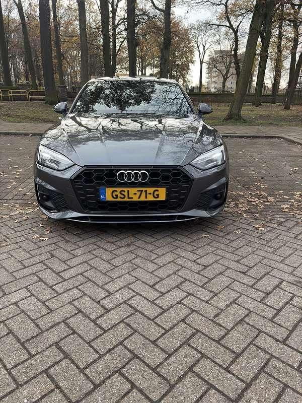 Grijs Gebruikt 2021 Audi A5 Hatchback | € 28.950 (Super prijs) - Afbeelding 1/4