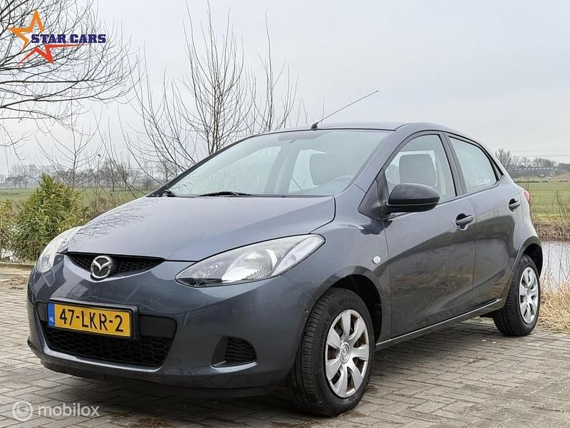 Grijs Occasion 2010 Mazda 2 Hatchback | € 3.950 (Goede deal) - Afbeelding 1/4