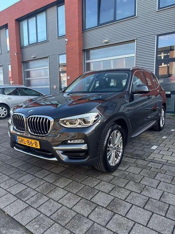 Zwart Gebruikt 2018 BMW X3 Luxury Line SUV | € 28.499 (Eerlijke prijs) - Afbeelding 1/4