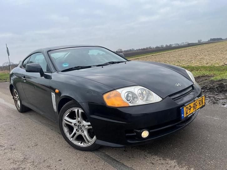 Occasion Hyundai Coupé Dynamiq 143 PK (105 kW) 2005 Zwart Coupé