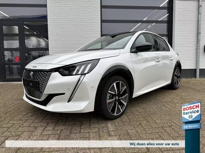 Oranje Gebruikt 2022 Peugeot e-208 GT Hatchback | € 27.995 - Afbeelding 1/4