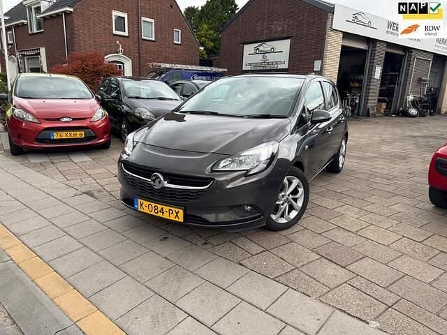 Grijs Gebruikt 2015 Opel Corsa Business Hatchback | € 2.999 (Goede deal) - Afbeelding 1/4