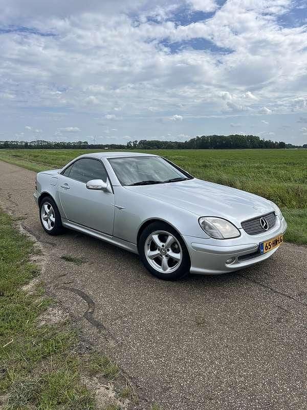 Grijs Gebruikt 2001 Mercedes SLK230 Cabriolet | € 4.500 (Eerlijke prijs) - Afbeelding 1/4