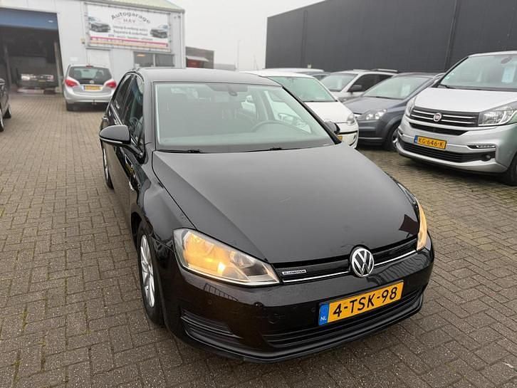 Zwart Gebruikt 2014 VW Golf VII Highline Hatchback | € 5.445 (Duur) - Afbeelding 1/4