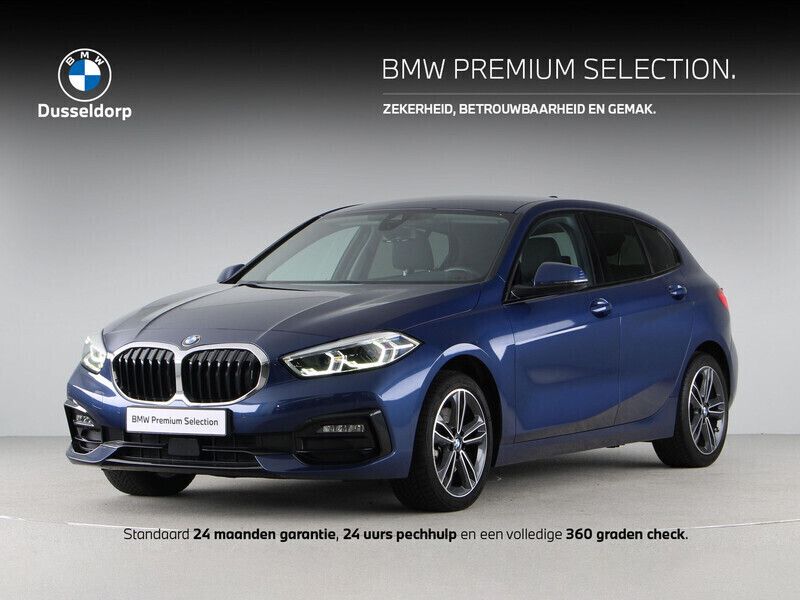 Blauw, metallic lak Gebruikt 2021 BMW 118 Sport Line Hatchback | € 24.900 (Eerlijke prijs) - Afbeelding 1/4