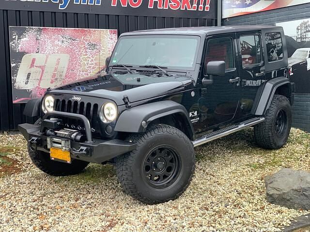 Zwart Gebruikt 2007 Jeep Wrangler Unlimited SUV | € 29.999 - Afbeelding 1/4