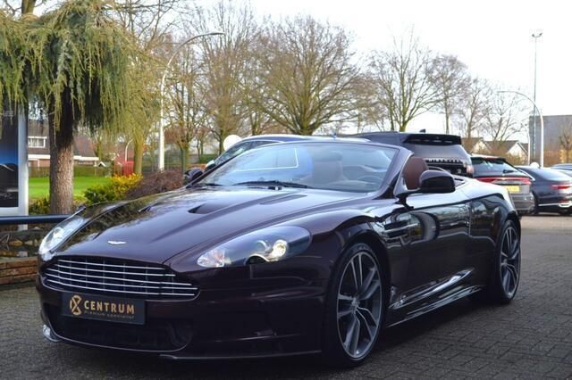 Paars, metallic lak Gebruikt 2010 Aston Martin DBS Cabriolet | € 129.750 - Afbeelding 1/4