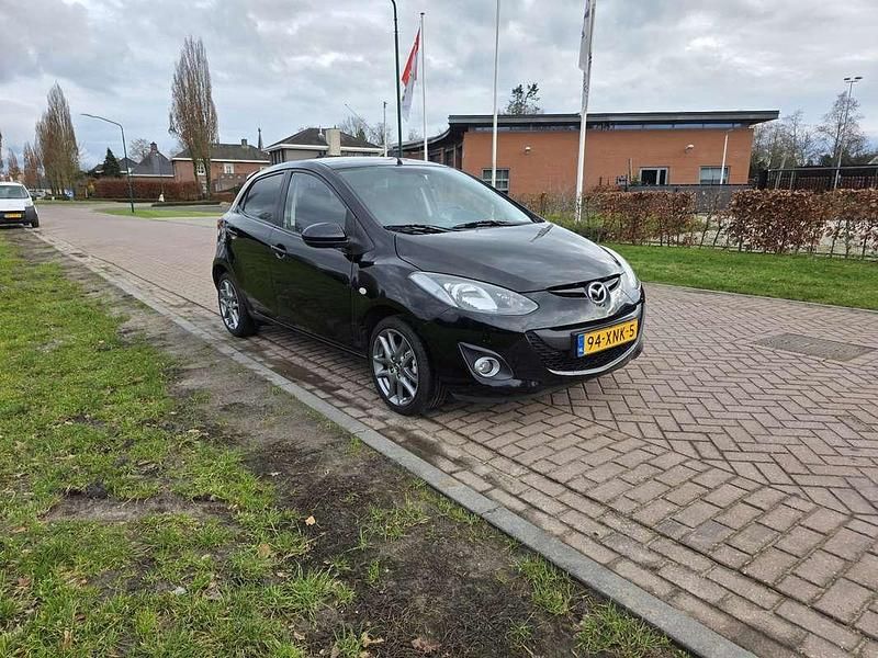 Occasion Mazda 2 84 PK (61 kW) 2012 Zwart Sedan
