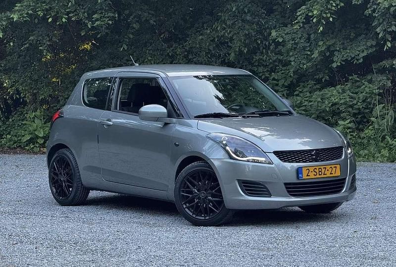 Grijs Gebruikt 2013 Suzuki Swift Comfort Hatchback | € 8.499 (Iets duurder) - Afbeelding 1/4