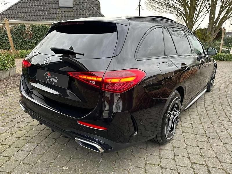 Occasion Mercedes C300e AMG line 204 PK (150 kW) 2023 Zwart Stationwagen