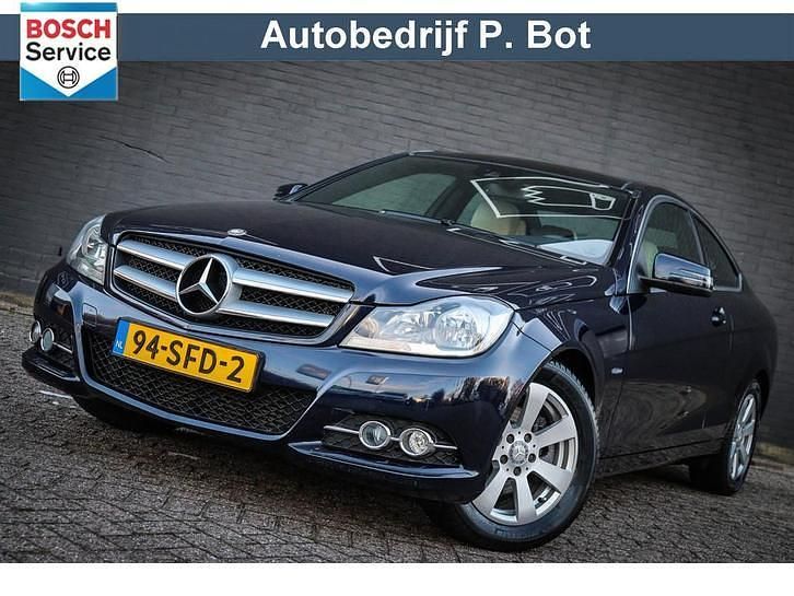 Blauw Occasion 2011 Mercedes C180 Coupé | € 11.950 (Iets duurder) - Afbeelding 1/4