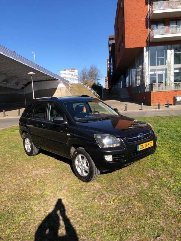 Zwart Gebruikt 2009 Kia Sportage Comfort SUV | € 4.750 (Iets duurder) - Afbeelding 1/4