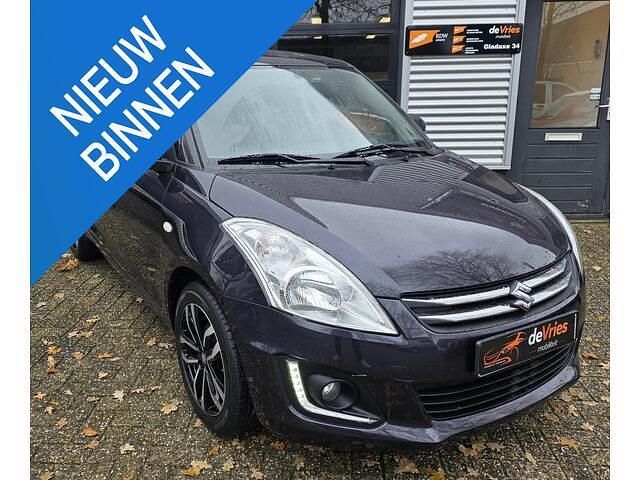 Grijs Occasion 2015 Suzuki Swift X-TRA Hatchback | € 8.950 (Eerlijke prijs) - Afbeelding 1/4