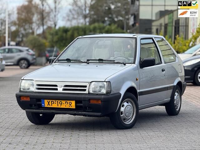 Grijs Gebruikt 1989 Nissan Micra Hatchback | € 2.895 - Afbeelding 1/4