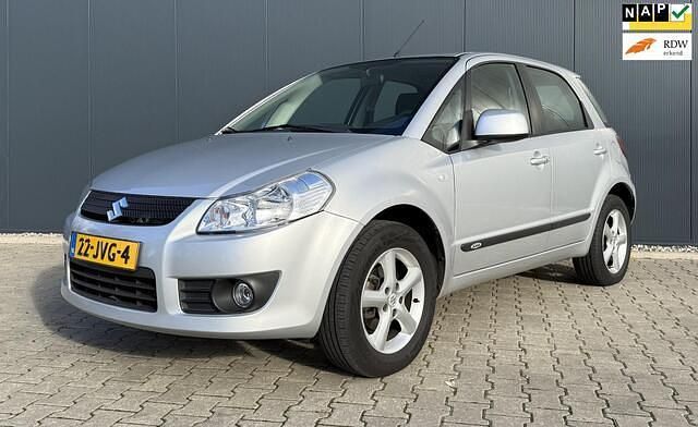 Grijs Gebruikt 2009 Suzuki SX4 Exclusive MPV | € 5.995 (Eerlijke prijs) - Afbeelding 1/4
