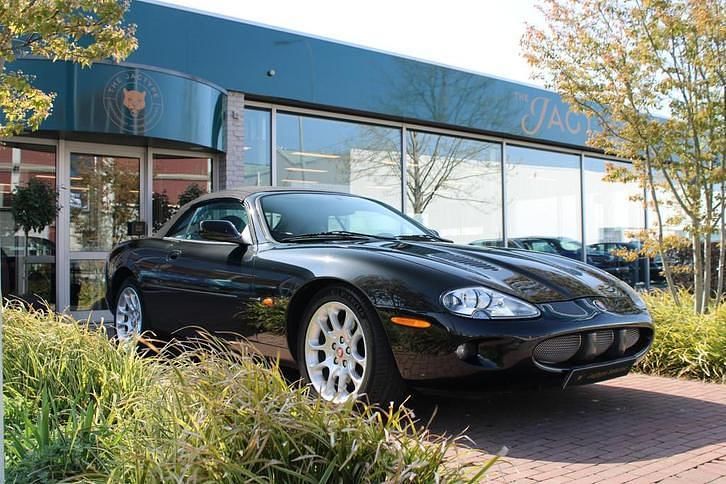 , metallic lak Gebruikt 1999 Jaguar XKR Cabriolet | € 19.950 (Goede deal) - Afbeelding 1/4