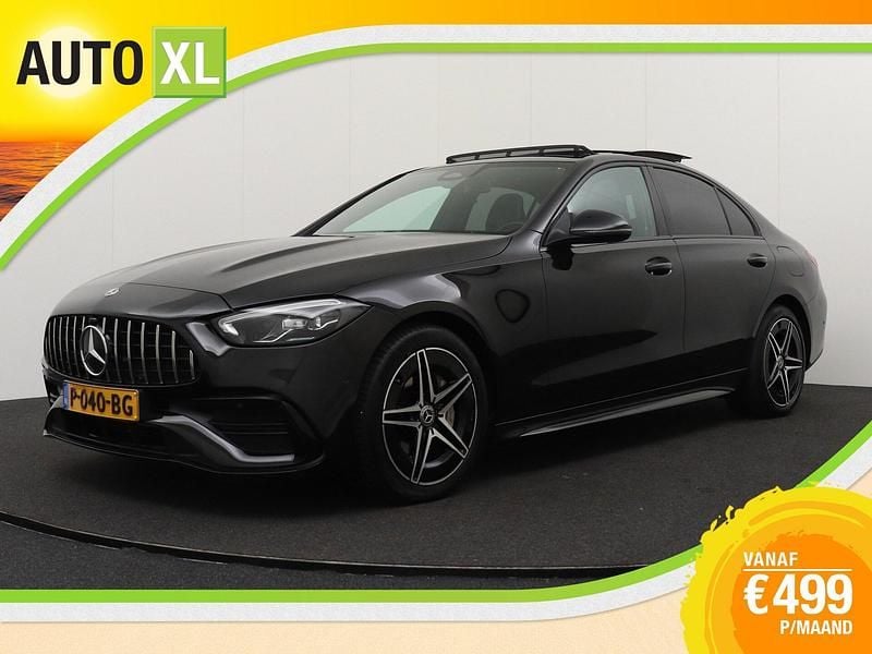 Zwart, metallic lak Gebruikt 2022 Mercedes C300 AMG line Sedan | € 35.940 (Goede deal) - Afbeelding 1/4