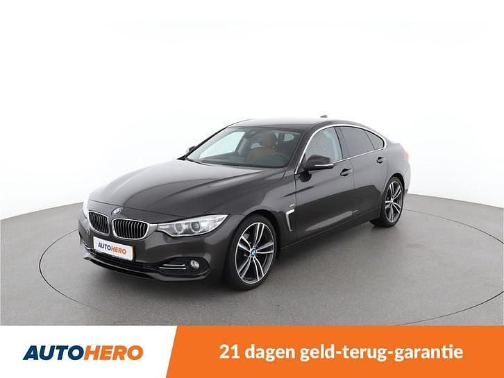 Bruin (metallic) Gebruikt 2015 BMW 420 Luxury Line Coupé | € 19.449 (Eerlijke prijs) - Afbeelding 1/4
