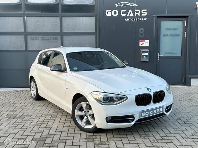 Wit Gebruikt 2013 BMW 116 Sport Line Hatchback | € 9.750 (Eerlijke prijs) - Afbeelding 1/4