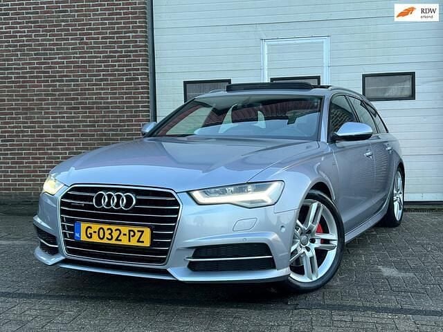 Grijs (metallic) Gebruikt 2015 Audi A6 S-Line Stationwagen | € 15.975 (Super prijs) - Afbeelding 1/4