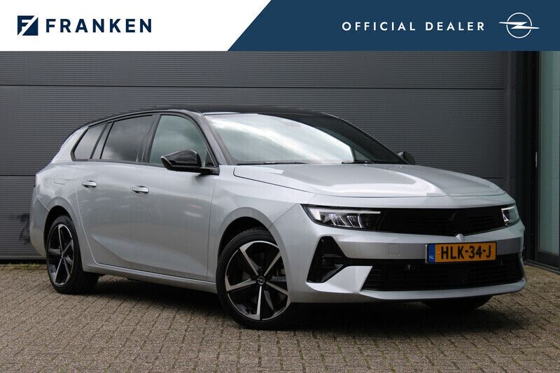 Grijs, metallic lak Gebruikt 2024 Opel Astra Stationwagen | € 29.600 (Super prijs) - Afbeelding 1/4
