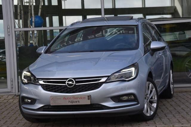 Grijs Gebruikt 2016 Opel Astra Edition Stationwagen | € 6.749 (Eerlijke prijs) - Afbeelding 1/4