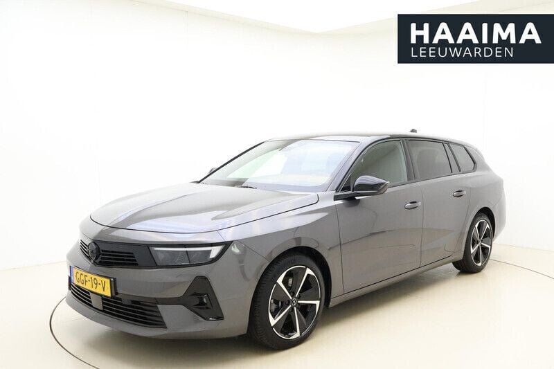 Grijs Gebruikt 2024 Opel Astra Stationwagen | € 33.950 (Eerlijke prijs) - Afbeelding 1/4
