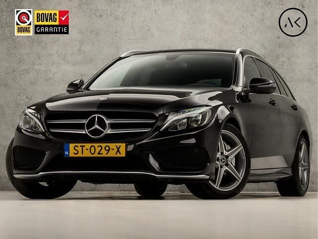 Zwart Gebruikt 2018 Mercedes C180 AMG Stationwagen | € 20.945 (Goede deal) - Afbeelding 1/4