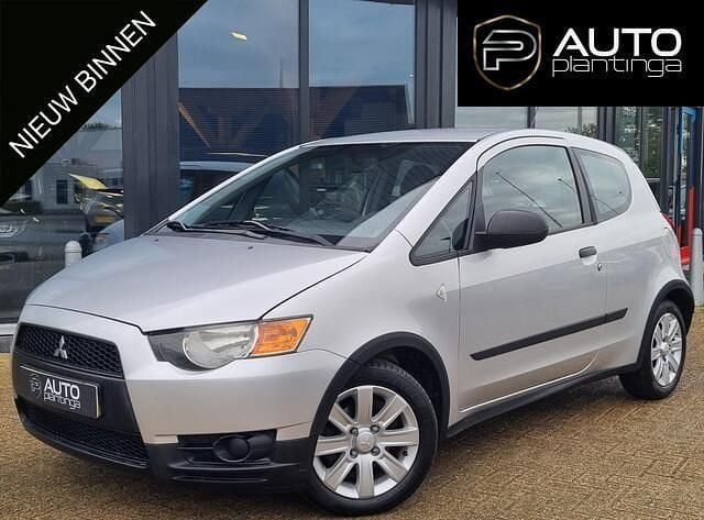 Grijs Gebruikt 2011 Mitsubishi Colt Edition Hatchback | € 2.895 (Eerlijke prijs) - Afbeelding 1/4