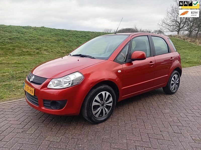 Oranje Gebruikt 2007 Suzuki SX4 Comfort MPV | € 4.250 (Eerlijke prijs) - Afbeelding 1/4