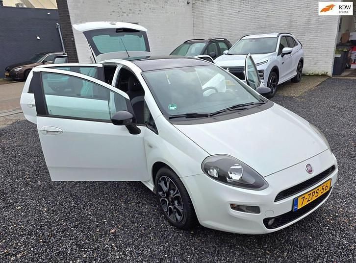 Wit (metallic) Occasion 2015 Fiat Punto Evo Racing Hatchback | € 2.999 (Goede deal) - Afbeelding 1/4