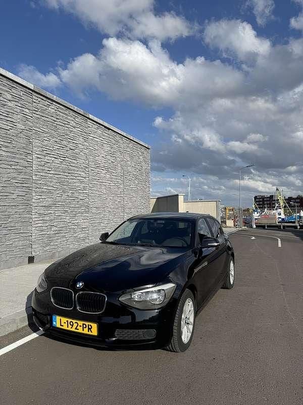 Zwart Gebruikt 2014 BMW 116 Hatchback | € 9.500 (Eerlijke prijs) - Afbeelding 1/4