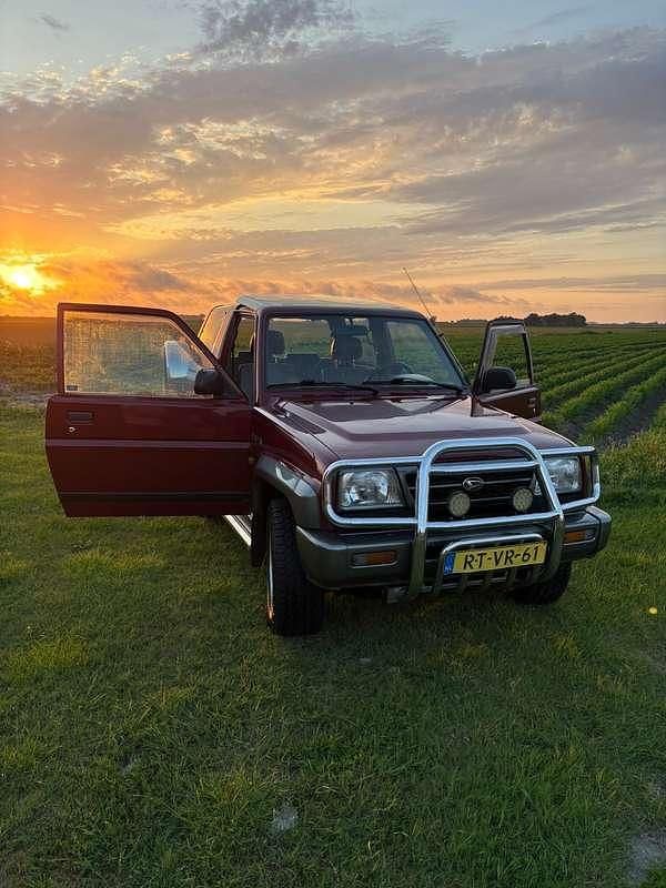 Rood Gebruikt 1997 Daihatsu Applause Stationwagen | € 4.000 - Afbeelding 1/4