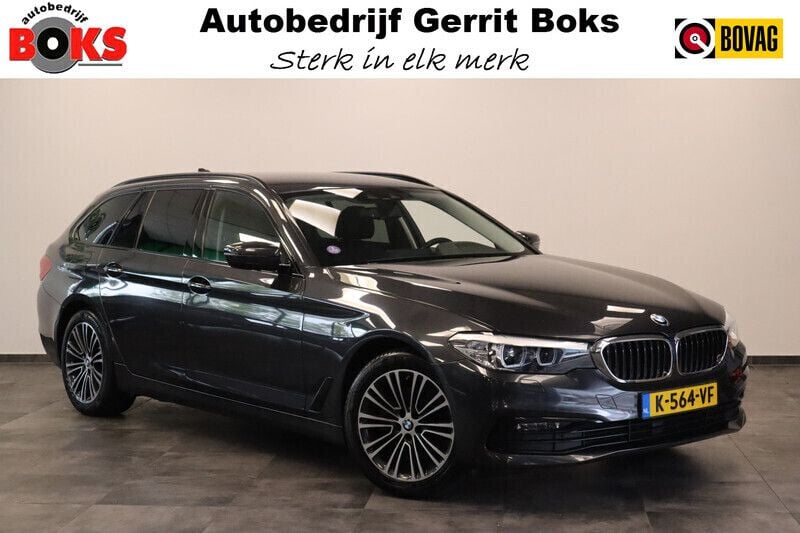 Grijs Gebruikt 2019 BMW 520 Executive Stationwagen | € 30.945 (Eerlijke prijs) - Afbeelding 1/3