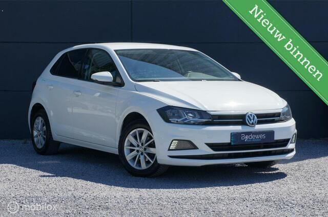 Wit, metallic lak Gebruikt 2018 VW Polo Comfortline Hatchback | € 10.990 (Eerlijke prijs) - Afbeelding 1/4