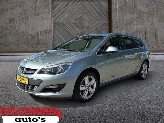 Grijs Gebruikt 2016 Opel Astra Business Stationwagen | € 6.650 (Eerlijke prijs) - Afbeelding 1/4