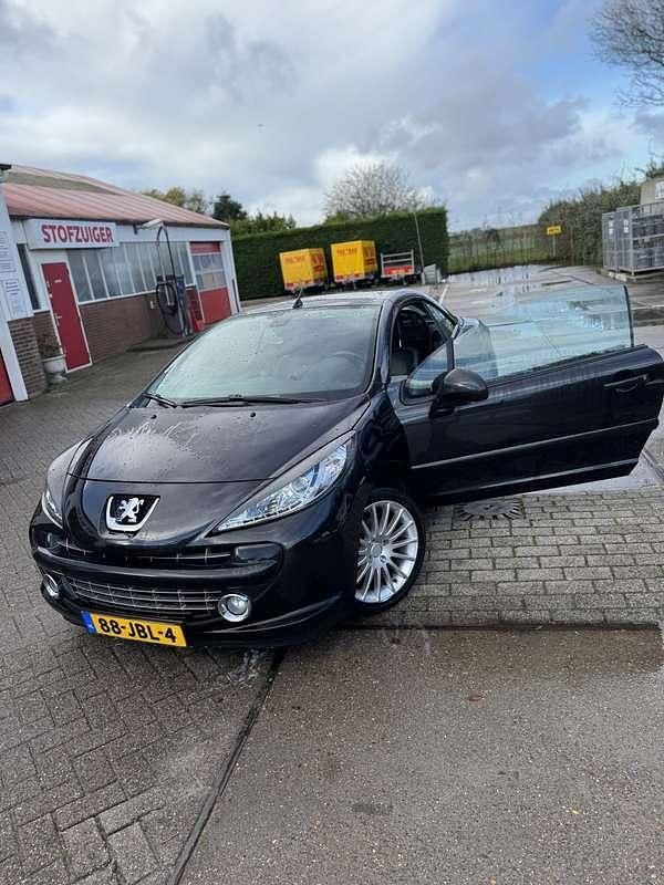 Zwart Gebruikt 2009 Peugeot 207 Cabriolet | € 3.500 (Eerlijke prijs) - Afbeelding 1/4