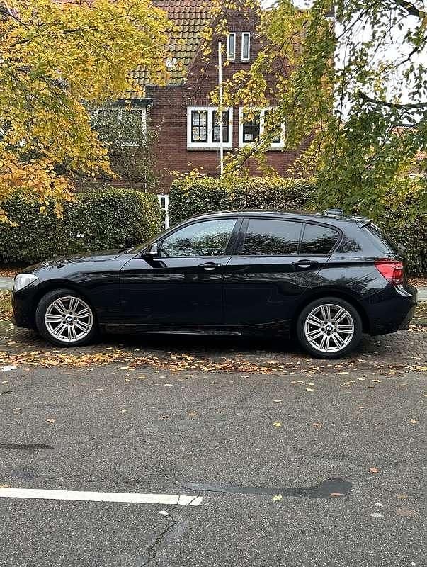 Zwart Gebruikt 2013 BMW 116 Hatchback | € 8.250 (Eerlijke prijs) - Afbeelding 1/4