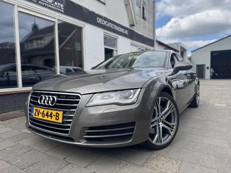 Grijs Gebruikt 2011 Audi A7 Sportback Hatchback | € 10.950 - Afbeelding 1/4
