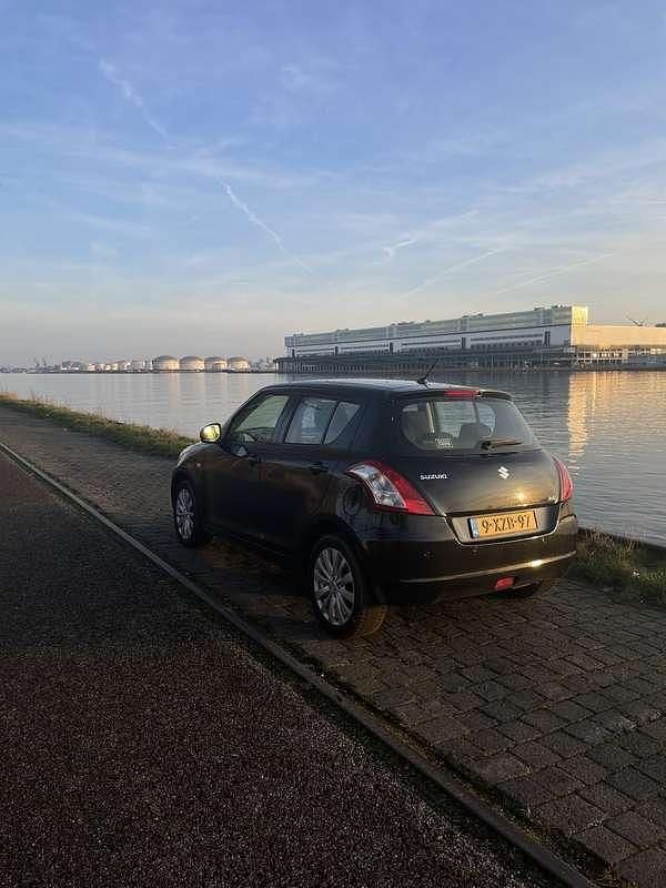 Occasion Suzuki Swift Exclusive 94 PK (69 kW) 2013 Zwart Hatchback