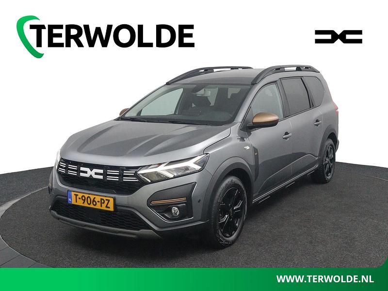 Grijs Gebruikt 2023 Dacia Jogger Extreme MPV | € 20.340 - Afbeelding 1/4