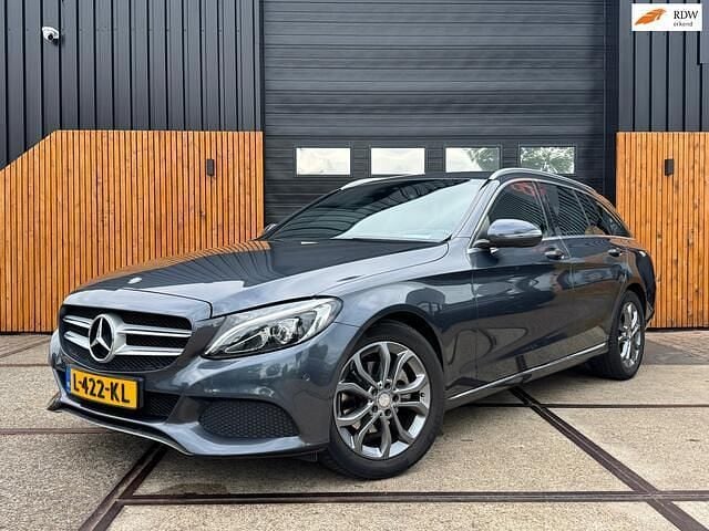 Grijs Gebruikt 2015 Mercedes C180 Ambition Stationwagen | € 16.999 (Eerlijke prijs) - Afbeelding 1/4
