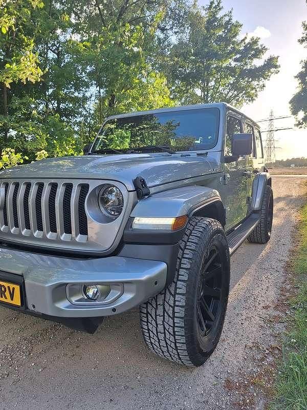 Grijs Occasion 2020 Jeep Wrangler Sahara SUV | € 54.500 (Eerlijke prijs) - Afbeelding 1/4